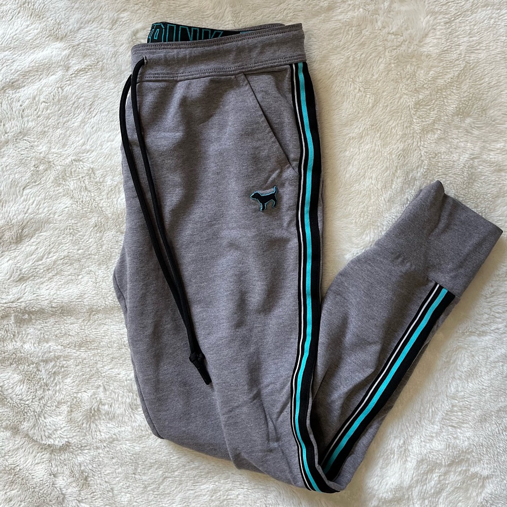PINK Sweatpants- gray with blue accents, drawstring waist, and pockets